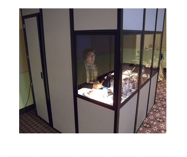2-Person Portable Interpretation Booth with interpreter broadcasting to listeners